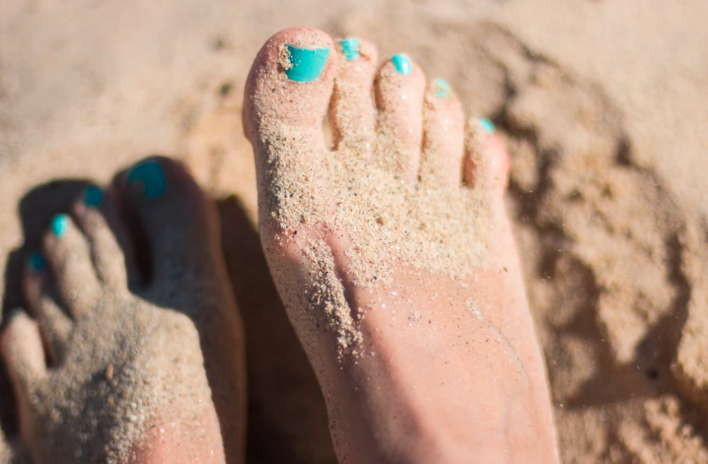 sand on feet